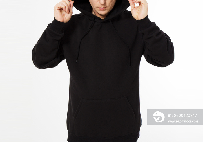middle-aged man in a black hooded sweatshirt looks down - front view, mock up cropped image