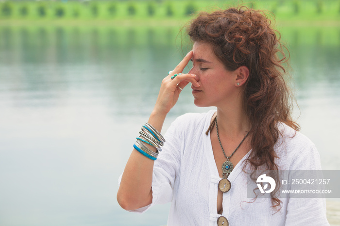 woman practice yoga breathing techniques  outdoor