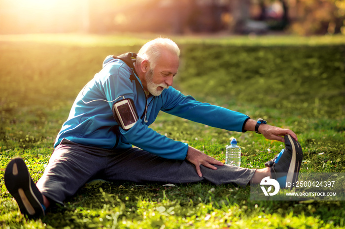 Senior man exercising in park