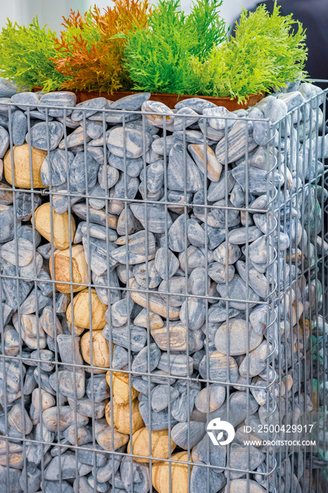 Fencing metal mesh filled with stones