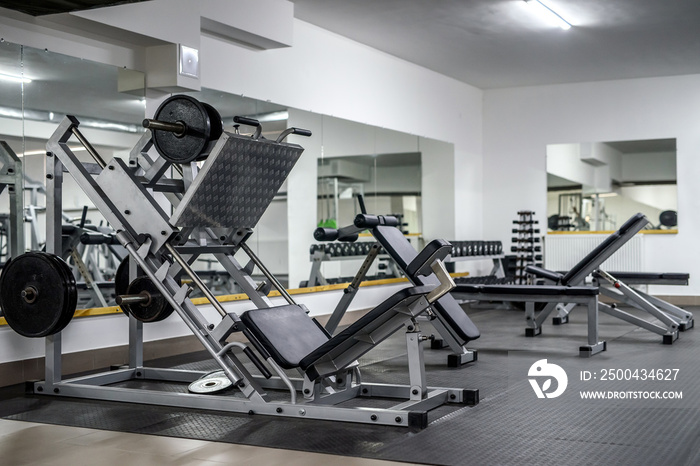 Modern and empty gym interior with equipment