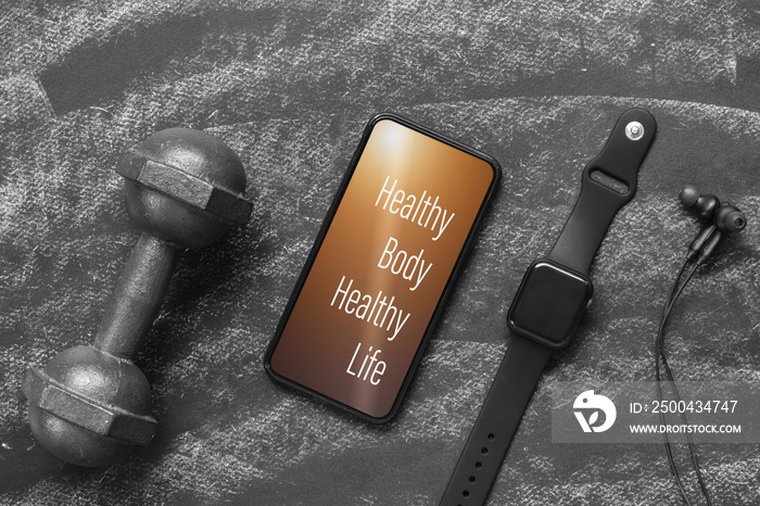 健身健康生活方式模拟智能手机概念。手机上的健康身体健康生活报价