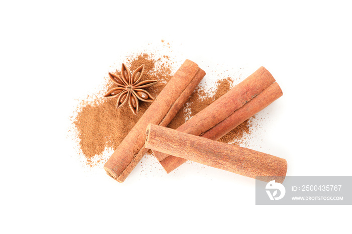 Cinnamon powder, sticks and anise isolated on white background