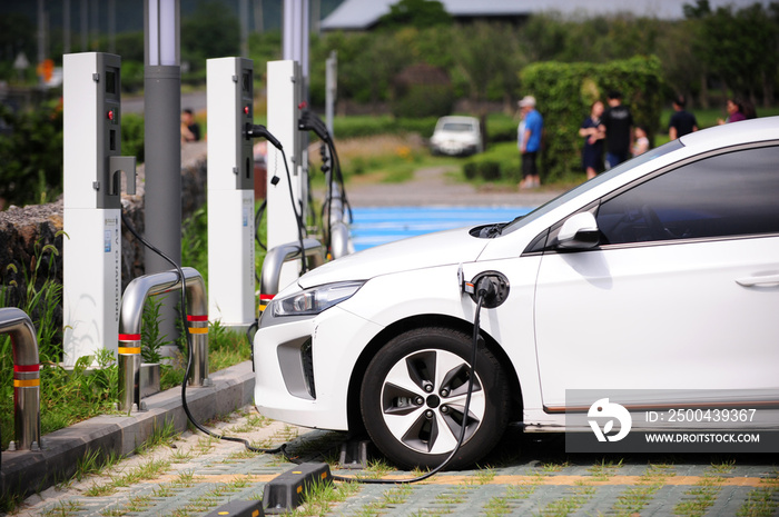 Charging electric vehicle in parking lot