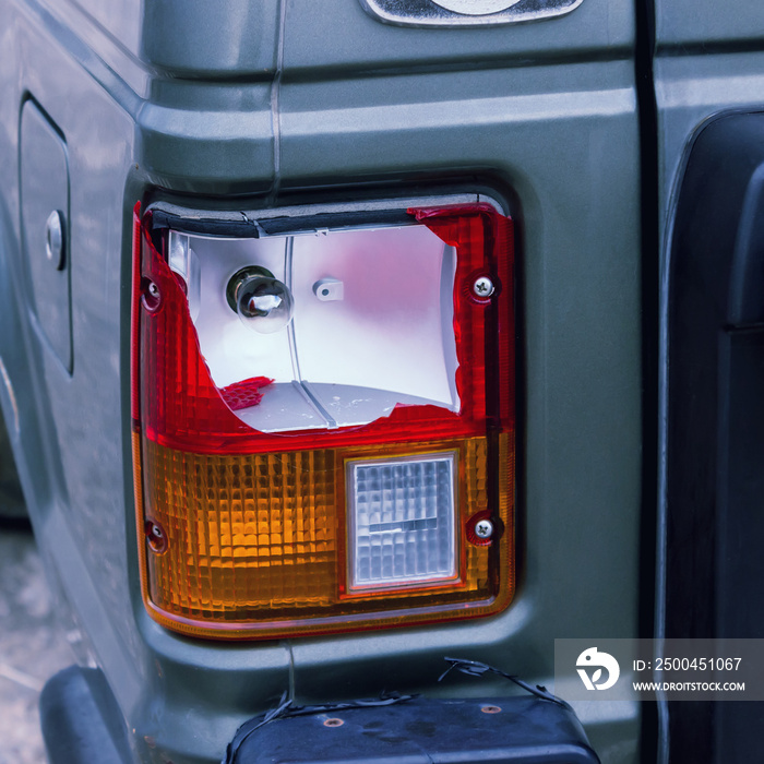 The rear lamp of the silver car broken by the accident. Concepts- accident, car insurance, traffic a