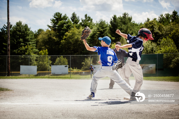 Baseball players playing in field