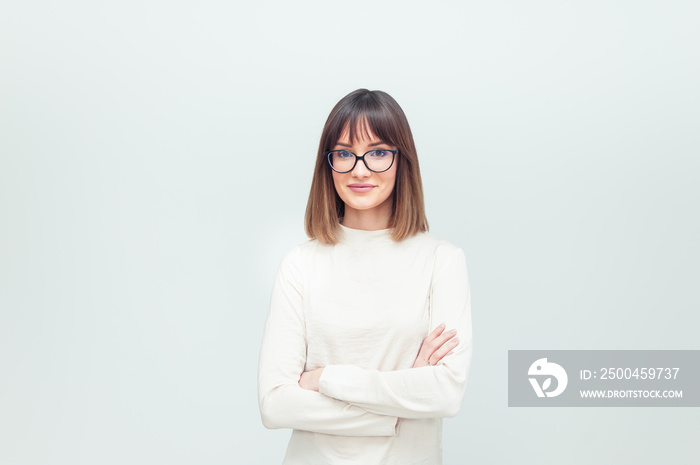 Portrait of beautiful woman in eyeglasses in office company