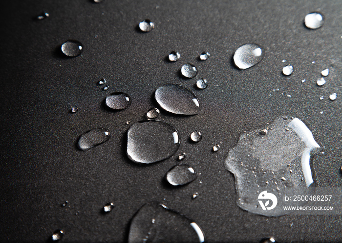 Drops of water on the floor From the liquid in the bottle plastic.