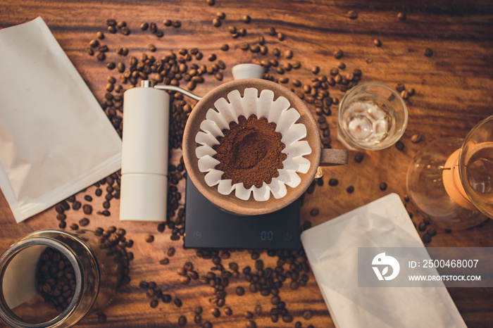 Top view coffee powder in the dripper for make coffee filter on scales. Prepare drip coffee with cof