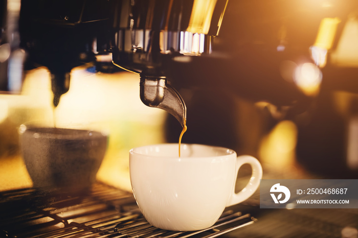 A cup of coffee straight from a coffee machine.