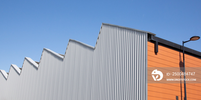 工业建筑型蓝天灰橙色工厂