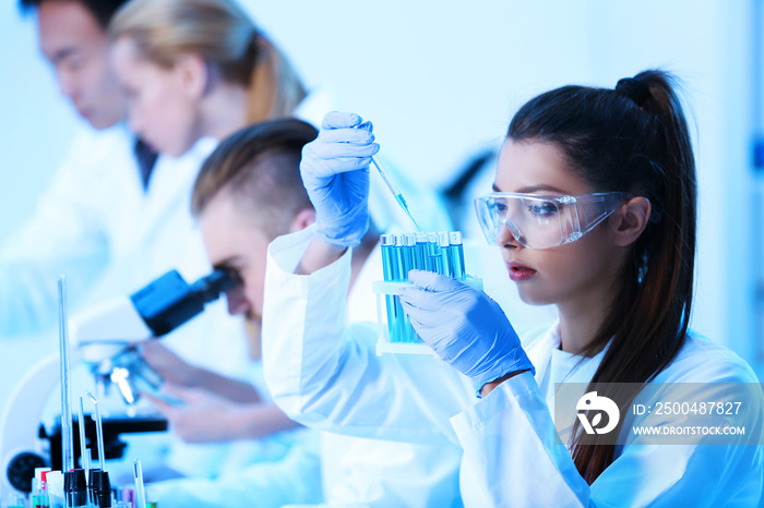 Young medical technicians working in laboratory