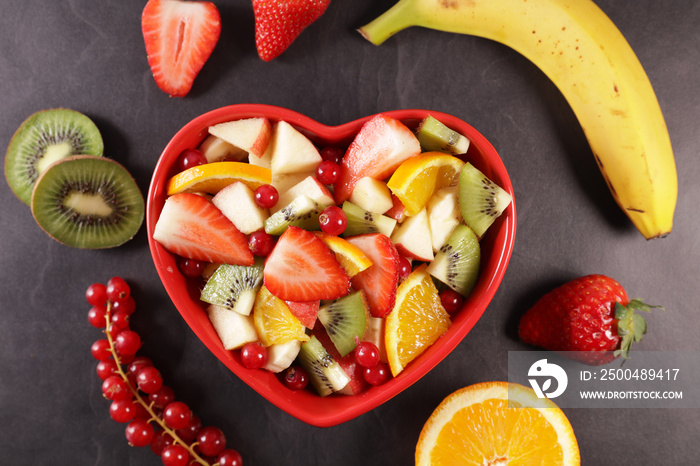 fresh fruit salad in heart bowl