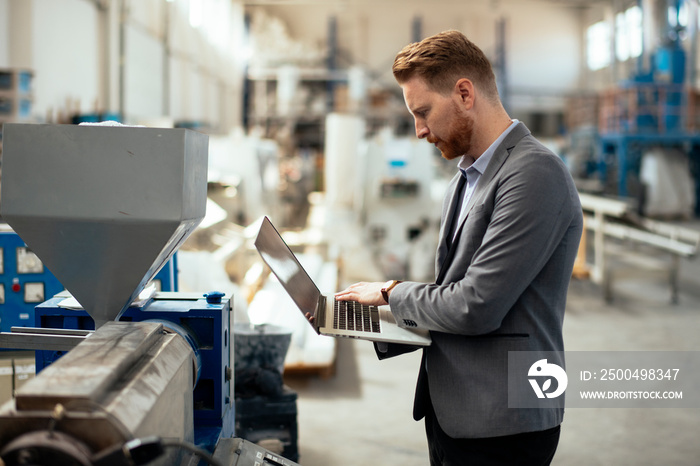 Manager checks machines at the factory. Inspector checks a factory.