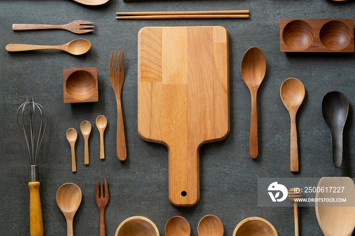 kitchen utensils for cooking on the black table background, food prepare concept