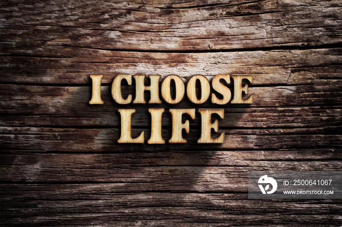 I choose Life. Words on old wooden board.