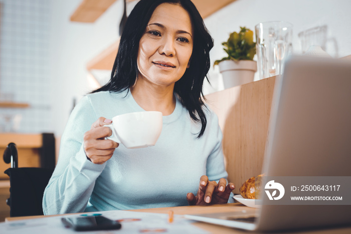 Tired woman working remotely