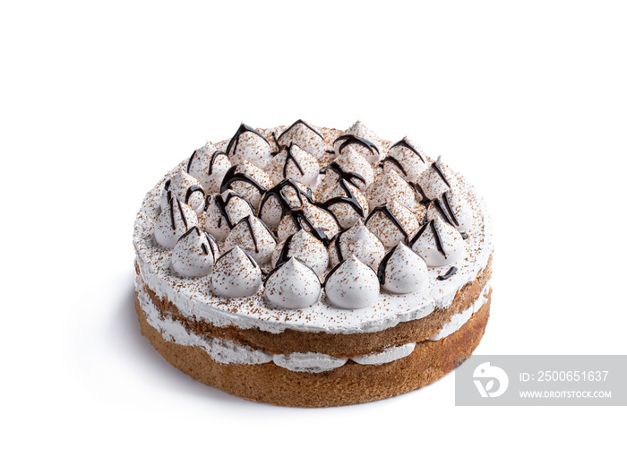 Sponge cake decorated with small meringue isolated on white