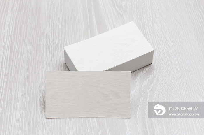 Business cards blank mockup - template on wood background