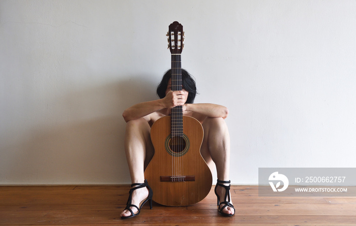 portrait of a woman with a guitar