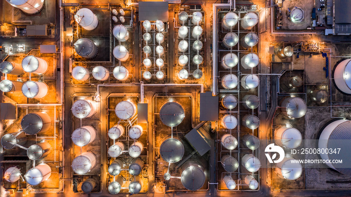 Liquid chemical tank terminal, Storage of liquid chemical and petrochemical products tank, Aerial view at night.