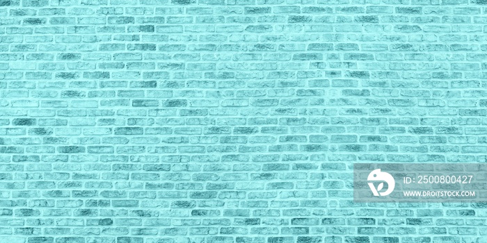 Bright turquoise old shabby brick wall wide texture. Light teal pastel color brickwork widescreen background