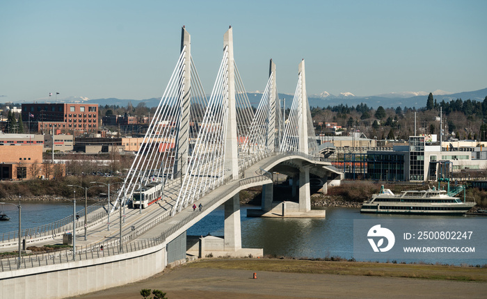 People Move Across Portland Bridge Willamette River Cascade Mountain Range