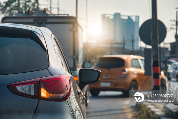 Transportation of luxury car open turn right signal prepare for U-Turn in the city.