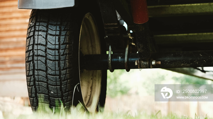 Wheel with a rubber tread from a car trailer