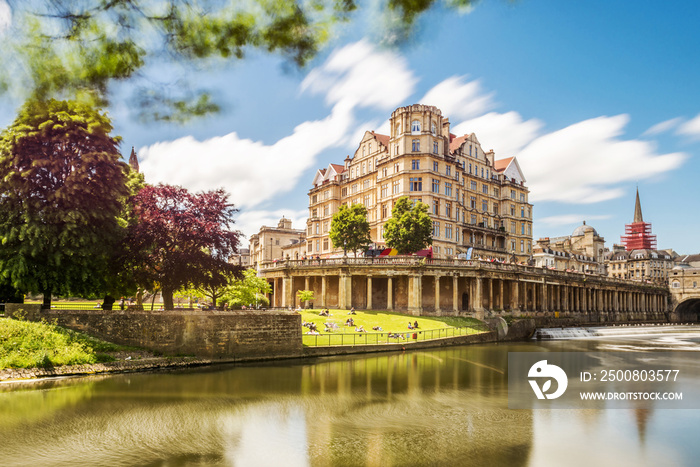 The Pulteney Bridge in Palladian style crosses the River Avon in Bath