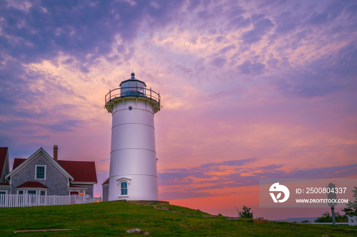 Dramatic sunrise cloudscape at Nobska Lighthouse in Woods Hole on Cape Cod, Massachusetts.