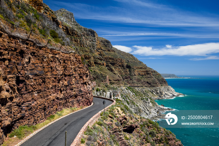 Chapman’s Peak Drive near Cape Town on Cape Peninsula - Western Cape, South Africa. Chapman’s Peak Drive is a 9 kilometer long coastal road from Hout Bay to Noordhoek, passing Chapman’s Peak mountain.