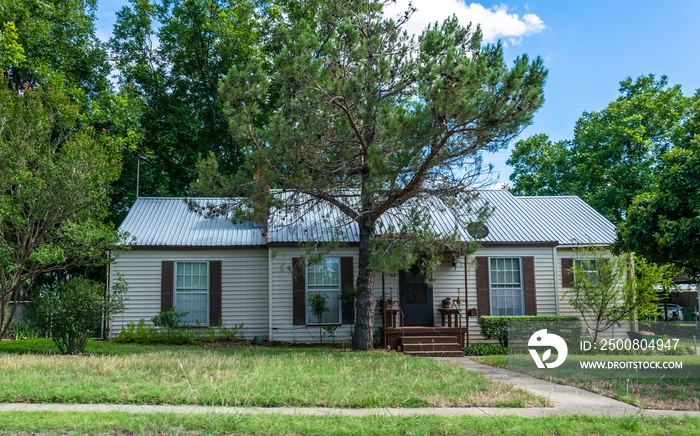 Modern rural life in Texas. Ancient wooden house and garden