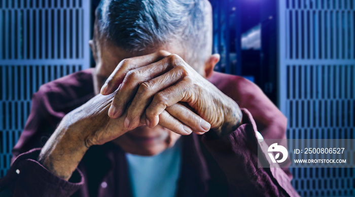 senior man covering his face with his hands. Depression and anxiety Copy space.