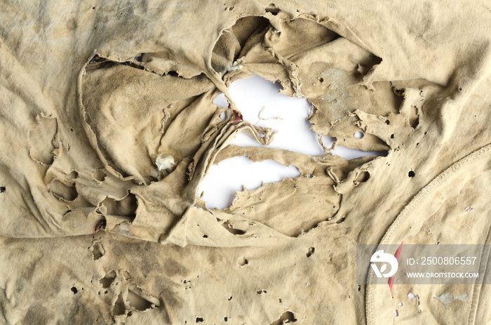 Old dirty torn rag isolated on white background. Cleaning rag.