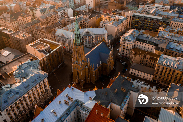 Panorama view of Riga city sunset near the old town including suspension bridge and main cathedral in the city center.