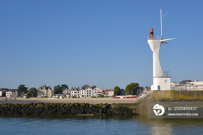 Modern lighthouse of Le Pouliguen seen from the side of the La Baule in Pays de la Loire region in western France.