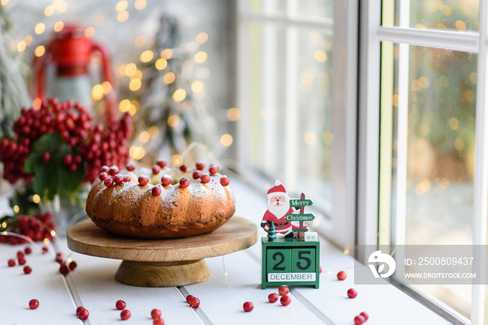 Traditional Christmas cranberry pie. Preparation of the festive table for the celebration of Christmas