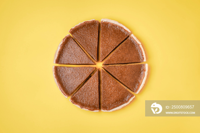 Sliced pumpkin pie. Traditional pie. Flat lay