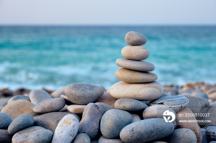 Zen balanced stones stack on beach