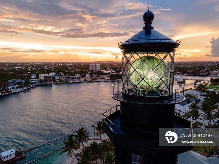 aerial drone of Hillsboro inlet, Florida with lighthouse and city