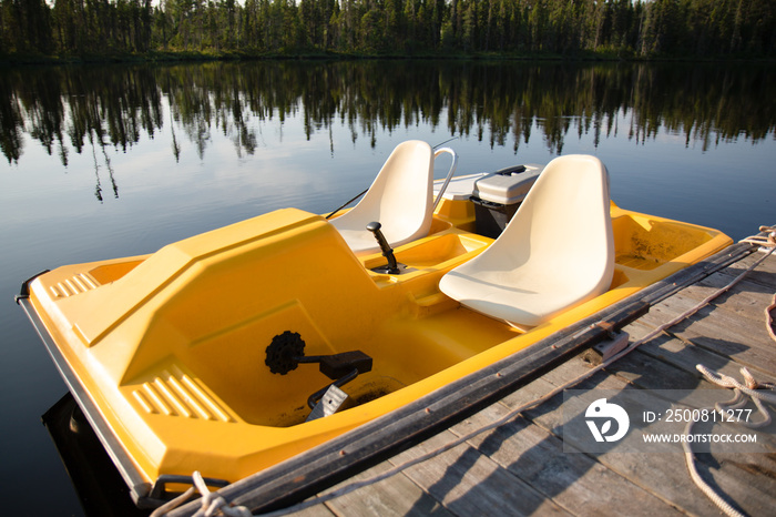 A paddle boat in the lake in Ontario Canada