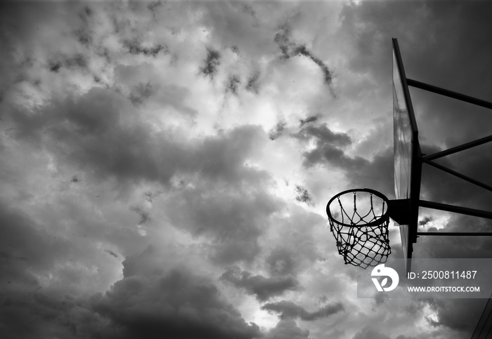 Basketball backboard with a ring on the street on the playground