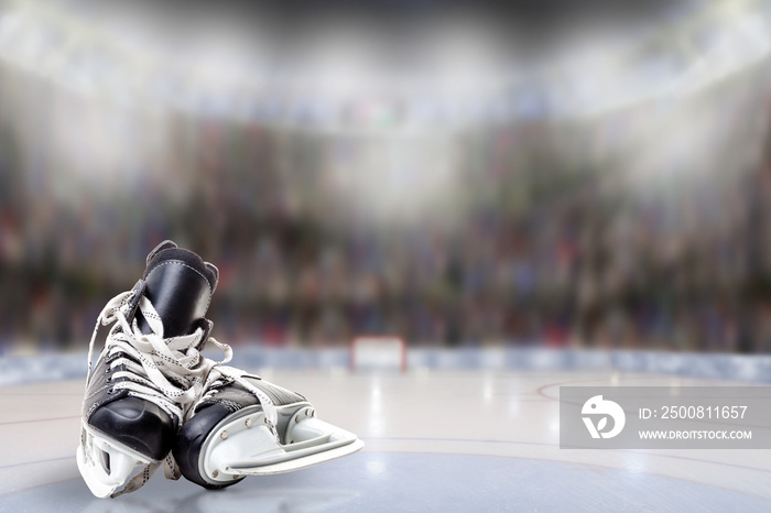 Ice Hockey Skates in Arena Rink With Copy Space