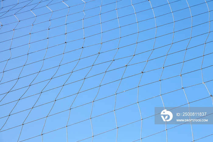 Fishing net over blue sky background