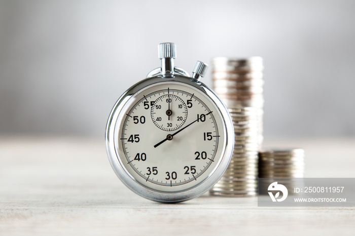 Analog stopwatch on grey background