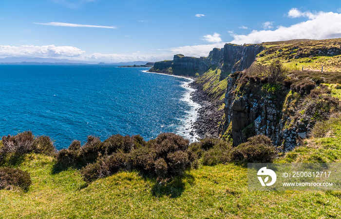 A panorama view towards the Kilt rocks and coastline on the Isle of Skye, Scotland on a summers day