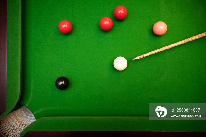 black ball shot in snooker game. top view