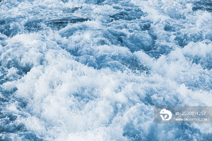 Stormy sea water with splashes and foam