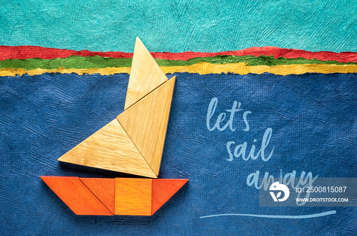 let’s sail away inspirational note with a sailing boat built from seven tangram wooden pieces over a landscape created with handmade textured bark paper, travel and vacation concept